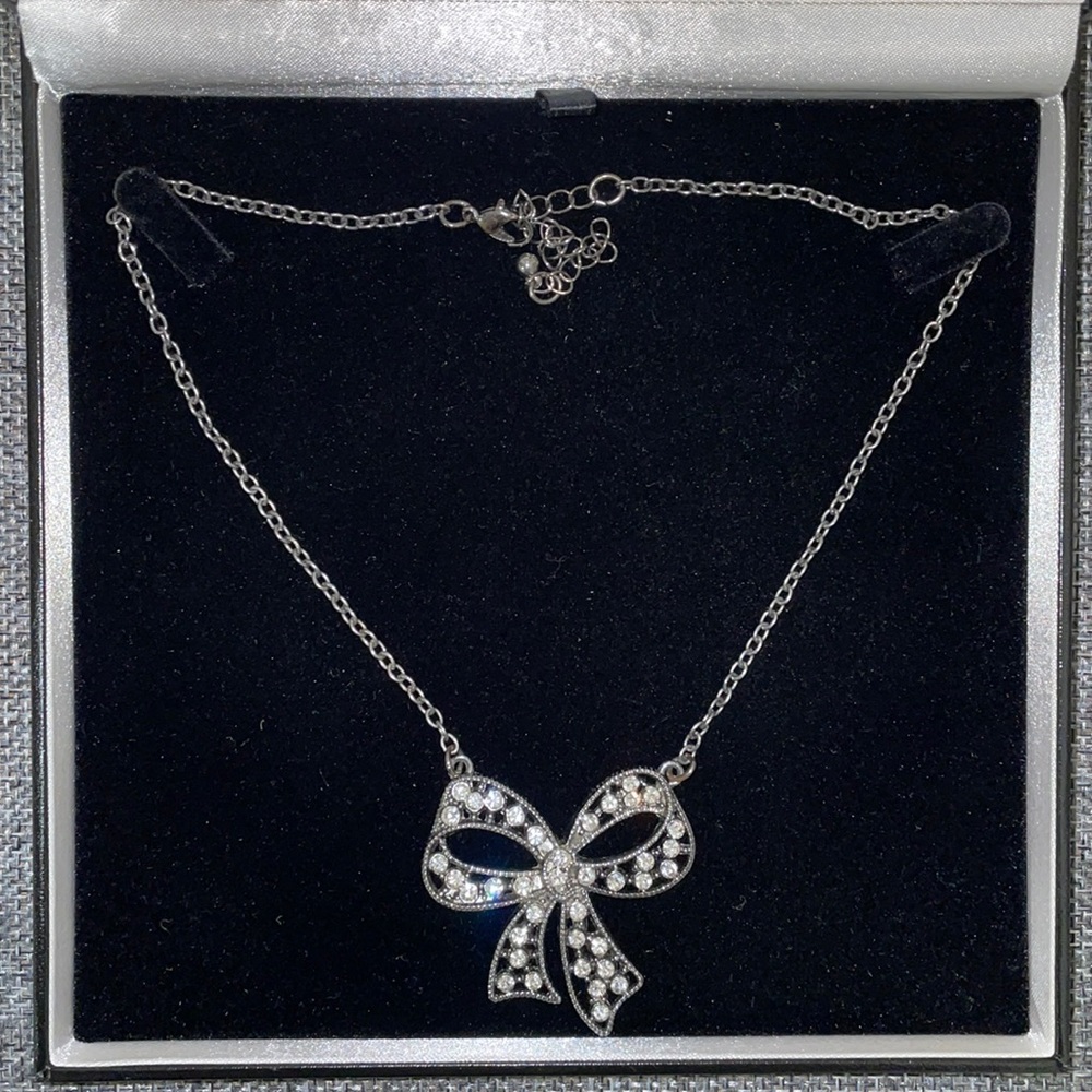 Gunmetal bow necklace with rhinestones